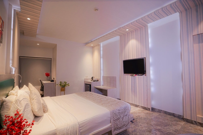 Imagen de la habitación del Hotel Swarn Towers. Foto 7