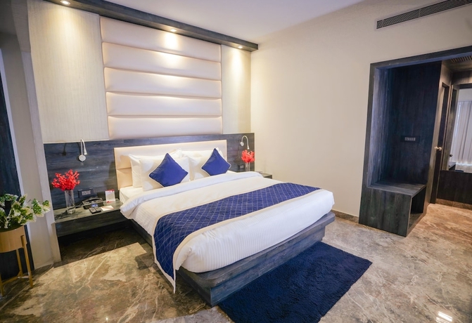 Imagen de la habitación del Hotel Swarn Towers. Foto 9