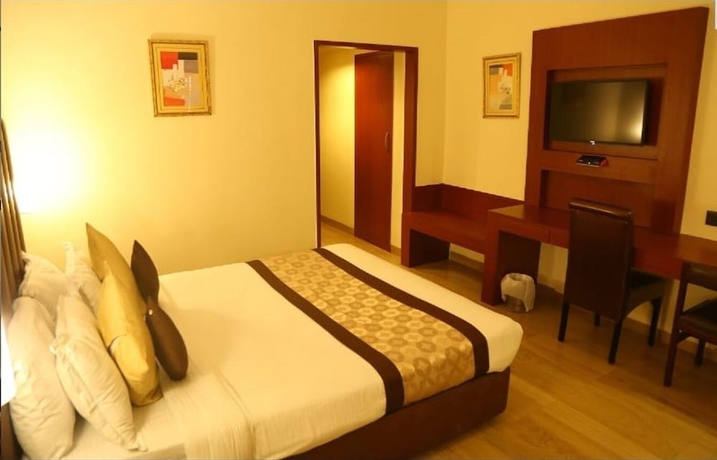 Imagen de la habitación del Hotel Swarn Towers. Foto 12