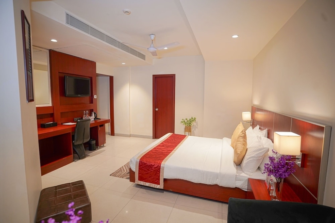 Imagen de la habitación del Hotel Swarn Towers. Foto 14