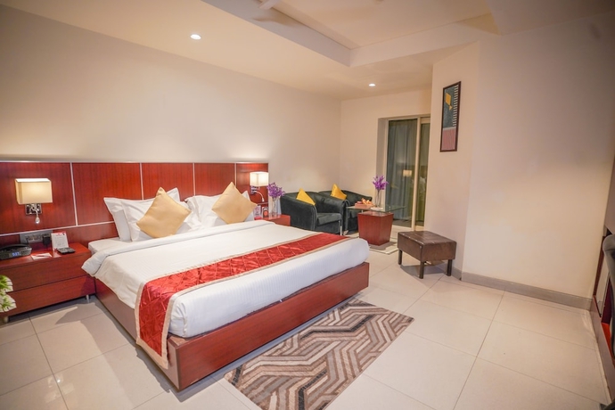 Imagen de la habitación del Hotel Swarn Towers. Foto 15
