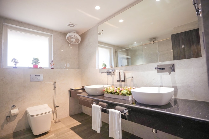 Imagen de la habitación del Hotel Swarn Towers. Foto 18