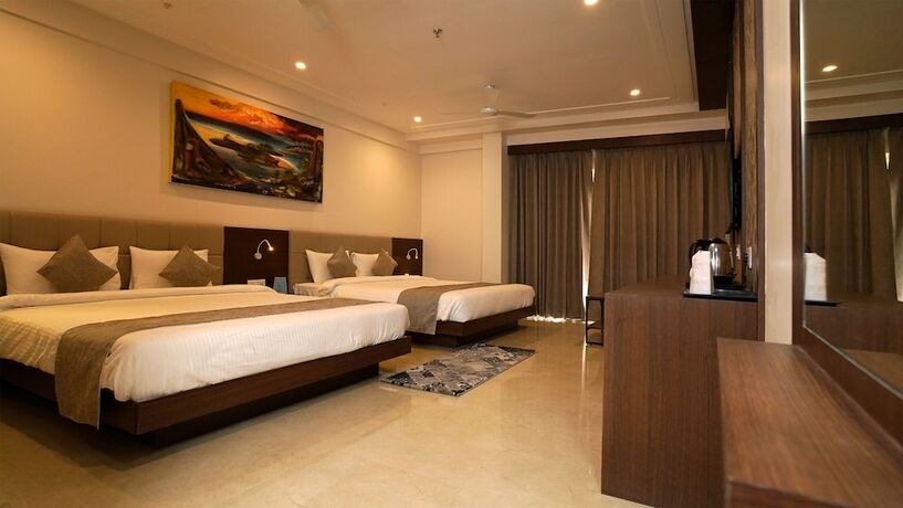 Imagen de la habitación del Hotel Swarna And Resort. Foto 15