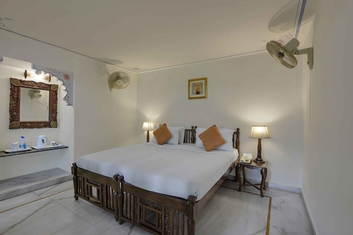 Imagen de la habitación del Hotel Swaroop Vilas - Lake Facing Boutique. Foto 11