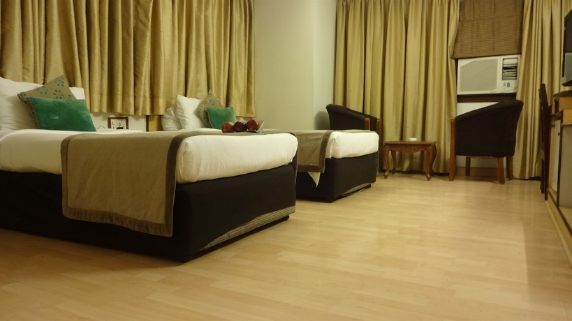 Imagen de la habitación del Hotel Swati Deluxe. Foto 4