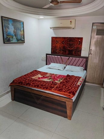 Imagen de la habitación del Hotel Sweet Dream, Rajkot. Foto 3