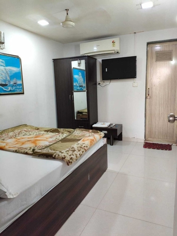 Imagen de la habitación del Hotel Sweet Dream, Rajkot. Foto 5