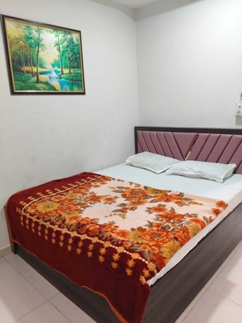 Imagen de la habitación del Hotel Sweet Dream, Rajkot. Foto 8