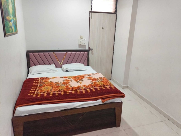 Imagen de la habitación del Hotel Sweet Dream, Rajkot. Foto 10
