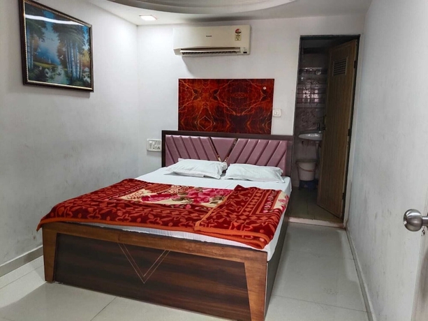 Imagen de la habitación del Hotel Sweet Dream, Rajkot. Foto 11