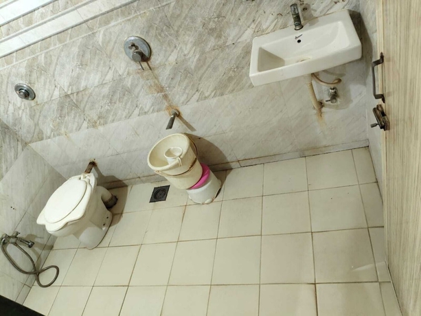 Imagen de la habitación del Hotel Sweet Dream, Rajkot. Foto 12