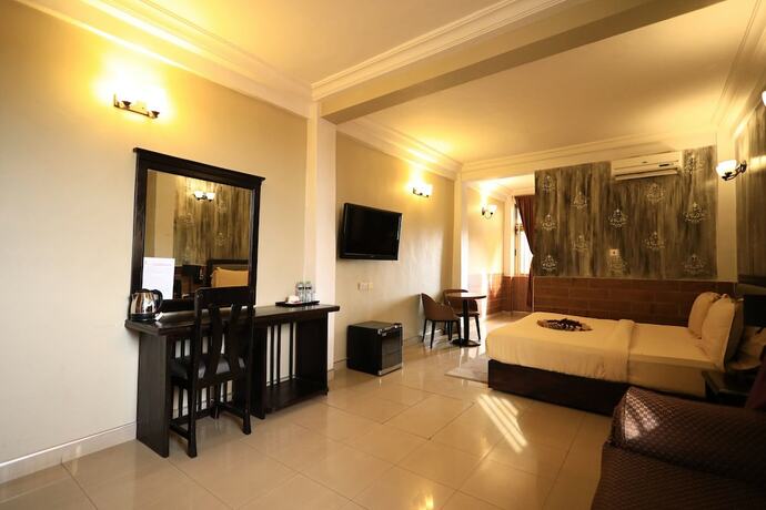 Imagen de la habitación del Hotel Sweet Garden. Foto 18