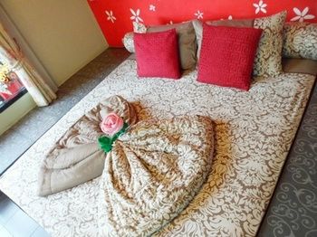 Imagen de la habitación del Hotel Sweet Garden Home Resort Satun. Foto 10