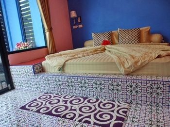 Imagen de la habitación del Hotel Sweet Garden Home Resort Satun. Foto 11