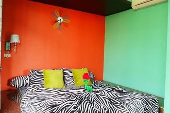 Imagen de la habitación del Hotel Sweet Garden Home Resort Satun. Foto 12