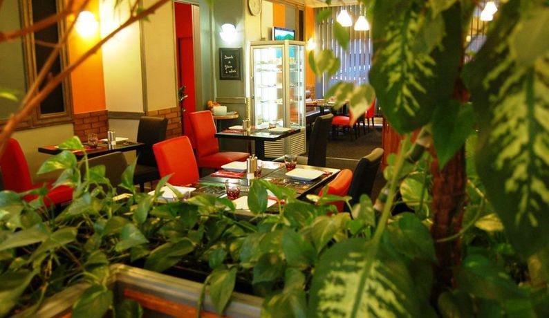 Imagen del bar/restaurante del Hotel Sweet Home, BELLEY. Foto 8