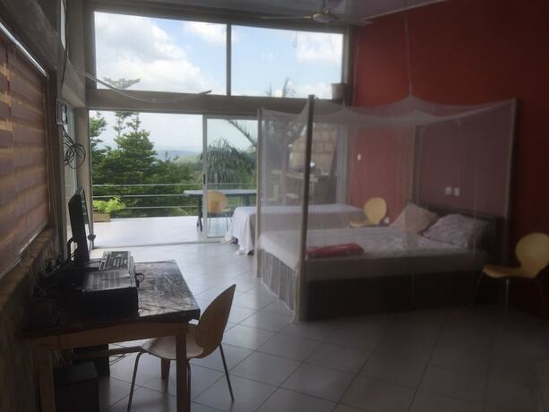 Imagen de la habitación del Hotel Sweet Mother Eco Resort. Foto 17