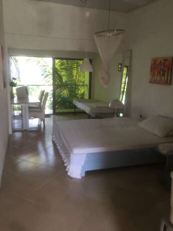 Imagen de la habitación del Hotel Sweet Mother Eco Resort. Foto 20
