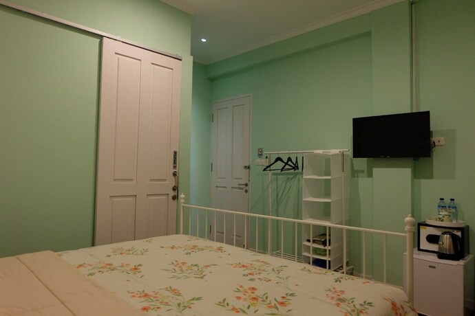 Imagen de la habitación del Hotel Sweet Peach House. Foto 22