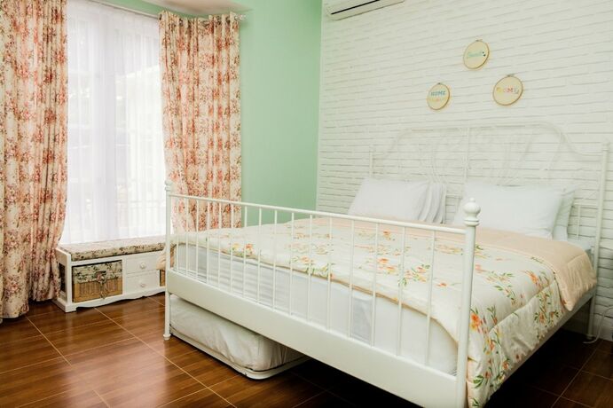 Imagen de la habitación del Hotel Sweet Peach House. Foto 27