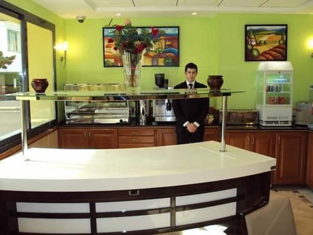 Imagen del bar/restaurante del Hotel Sweet, Rouiba. Foto 4