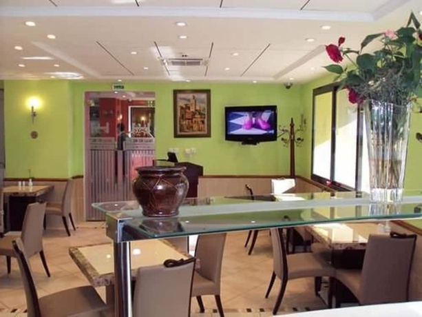 Imagen del bar/restaurante del Hotel Sweet, Rouiba. Foto 5