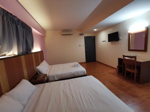 Imagen de la habitación del Hotel Sweet Star. Foto 13