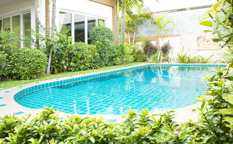 Imagen de la habitación del Hotel Sweet Villa Pattaya. Foto 19