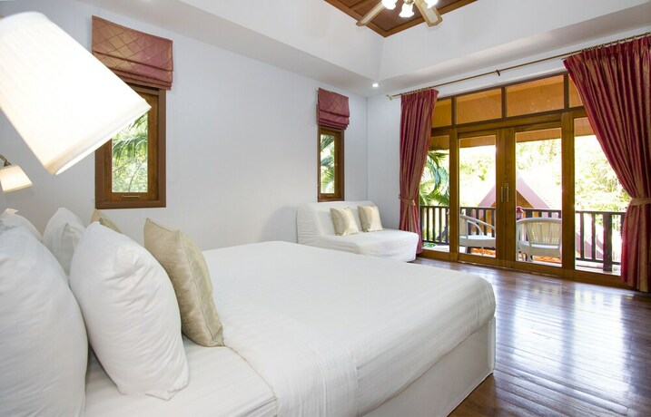 Imagen de la habitación del Hotel Sweet Villa Pattaya. Foto 24