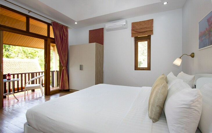Imagen de la habitación del Hotel Sweet Villa Pattaya. Foto 31