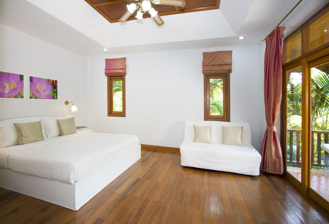 Imagen de la habitación del Hotel Sweet Villa Pattaya. Foto 33