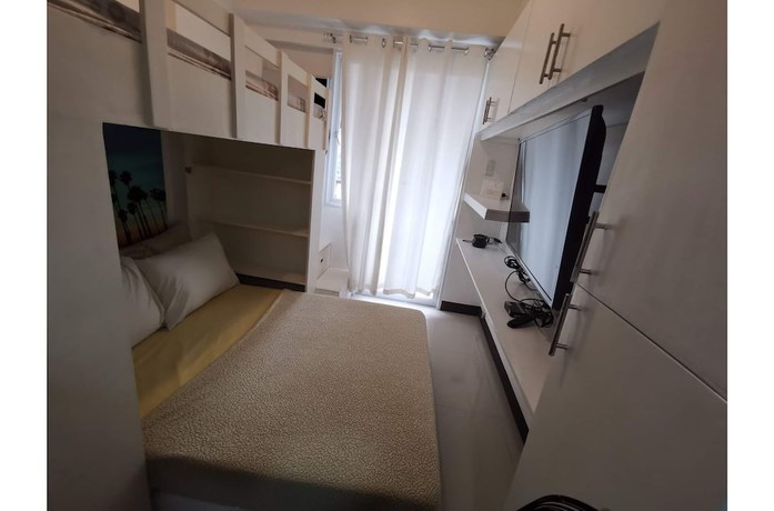 Imagen de la habitación del Hotel SweetSuites at Pine Crest New Manila. Foto 7