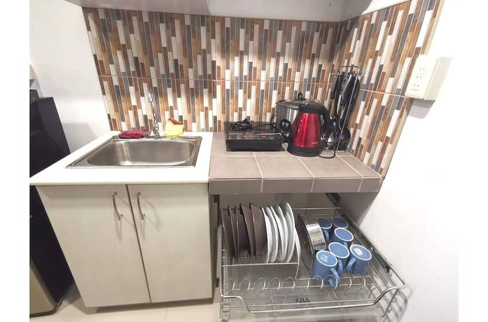 Imagen de la habitación del Hotel SweetSuites at Pine Crest New Manila. Foto 10