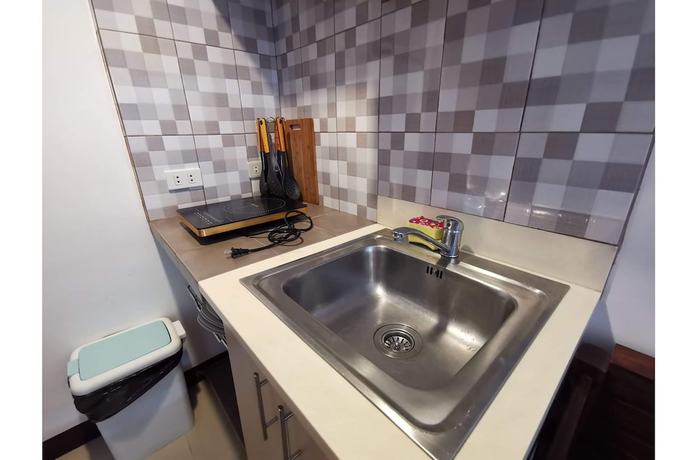Imagen de la habitación del Hotel SweetSuites at Pine Crest New Manila. Foto 11