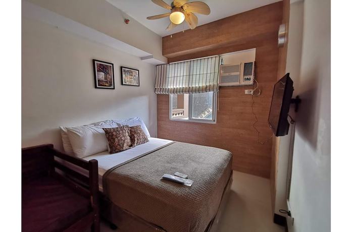 Imagen de la habitación del Hotel SweetSuites at Pine Crest New Manila. Foto 13