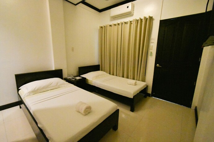 Imagen de la habitación del Hotel Swiftlets Inn. Foto 18