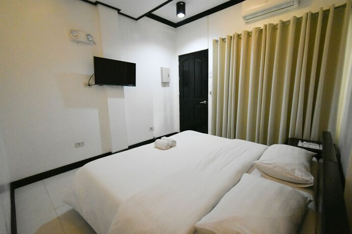 Imagen de la habitación del Hotel Swiftlets Inn. Foto 19
