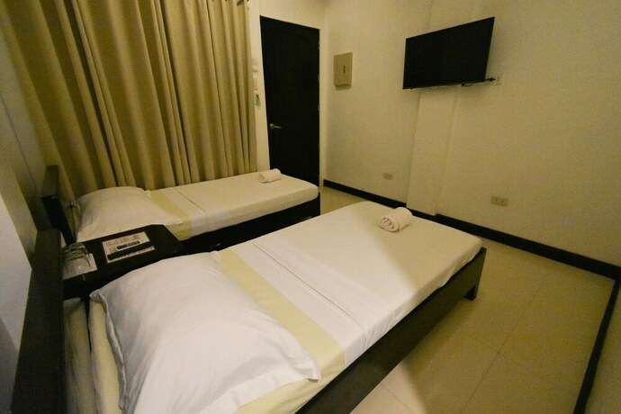 Imagen de la habitación del Hotel Swiftlets Inn. Foto 37