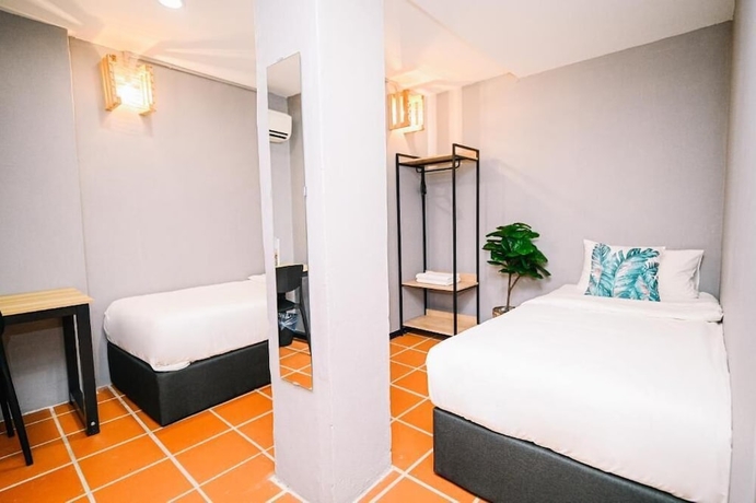 Imagen de la habitación del Hotel Swing and Pillows at 87 Chulia St. Foto 3