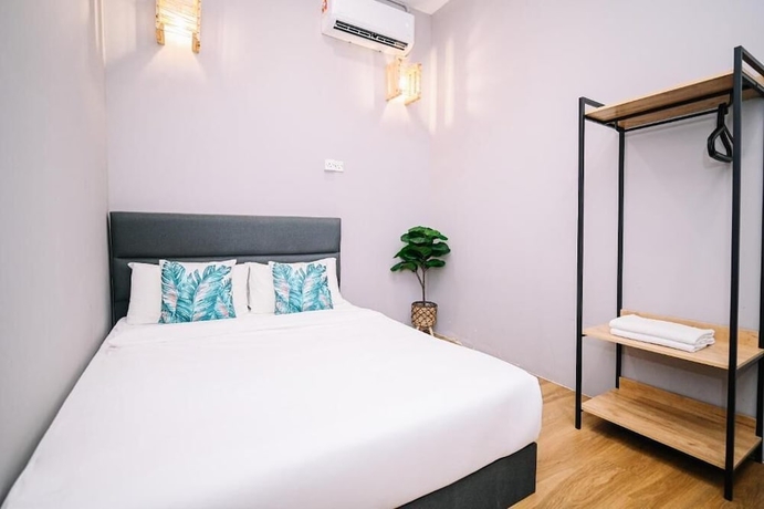 Imagen de la habitación del Hotel Swing and Pillows at 87 Chulia St. Foto 7