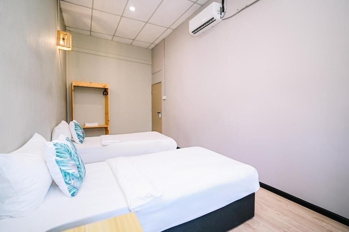 Imagen de la habitación del Hotel Swing and Pillows at 87 Chulia St. Foto 9
