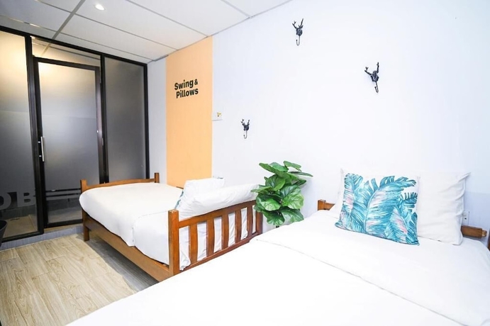 Imagen de la habitación del Hotel Swing and Pillows at Beach Street. Foto 6