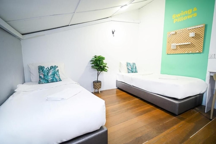 Imagen de la habitación del Hotel Swing and Pillows at Beach Street. Foto 13