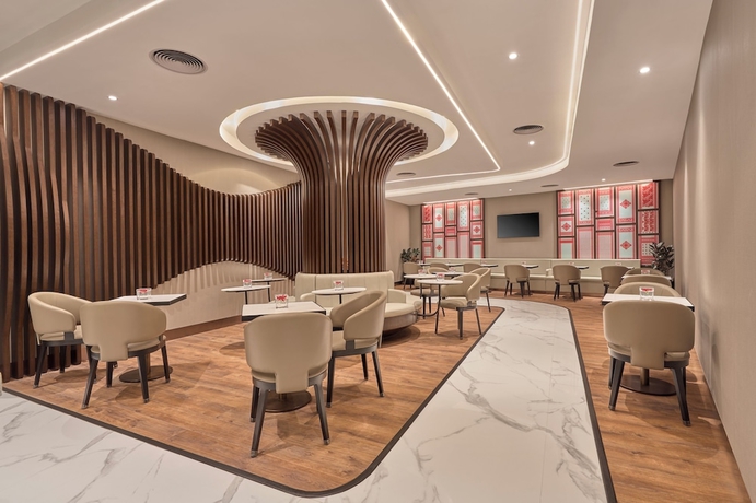 Imagen del bar/restaurante del Hotel Swirl Transit Guwahati by Adani. Foto 2