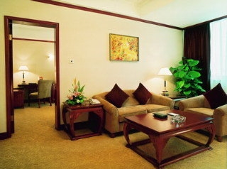 Imagen de la habitación del Hotel Swiss Belhotel Hualun. Foto 12