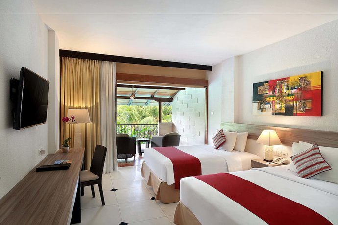 Imagen de la habitación del Hotel Swiss Belhotel Segara Segara Resort & Spa. Foto 10