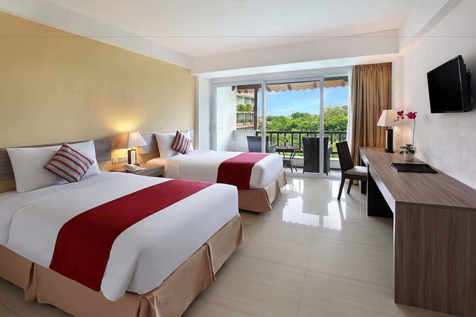 Imagen de la habitación del Hotel Swiss Belhotel Segara Segara Resort & Spa. Foto 14