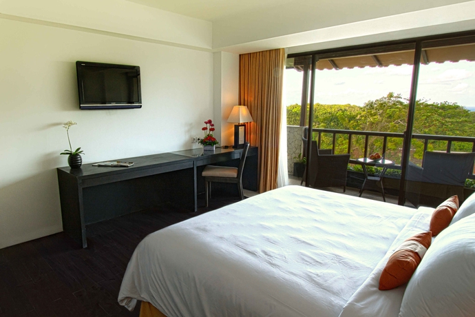 Imagen de la habitación del Hotel Swiss Belhotel Segara Segara Resort & Spa. Foto 26