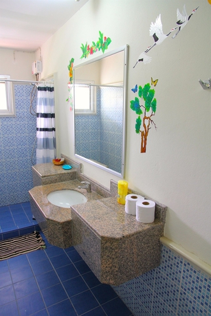 Imagen de la habitación del Hotel Swiss Chalet Guesthouse. Foto 15