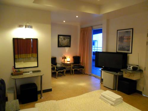 Imagen de la habitación del Hotel Swiss Food Restaurant And. Foto 2